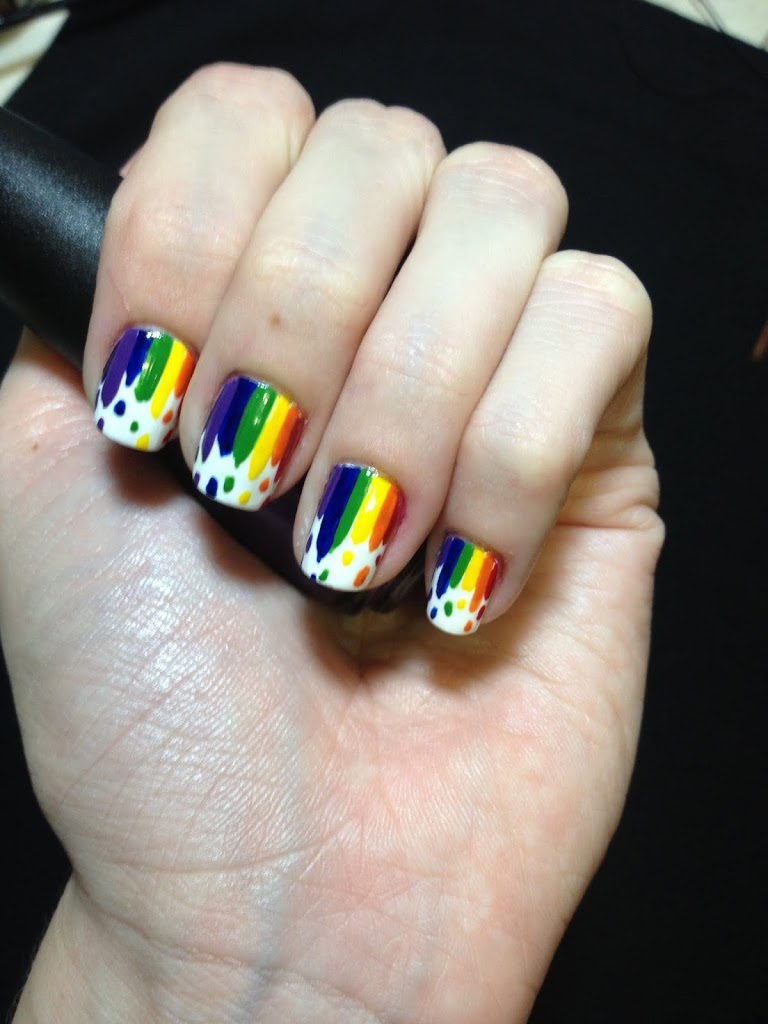 Dripping rainbow nails, four fingers